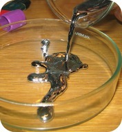 Pouring liquid mercury