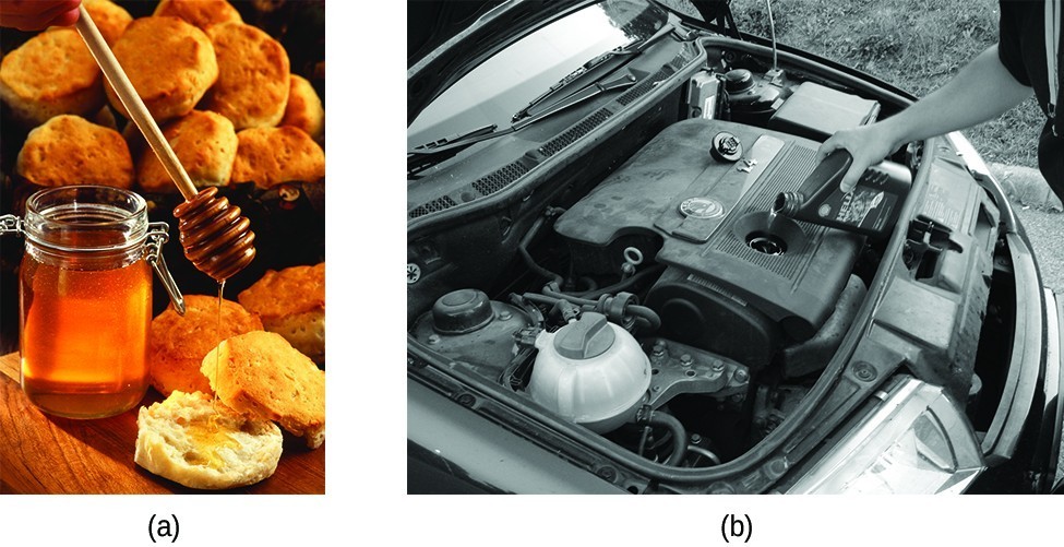 a) is a photo of honey being put on a biscuit. b) is a black and white photo of a person adding motor oil to a car engine. 