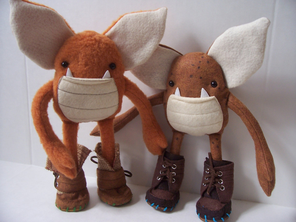 Photo of two hand-made felt goblins called 