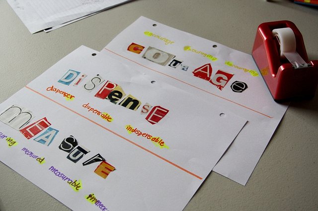 Letters cut from newspapers to form vocabulary sheets