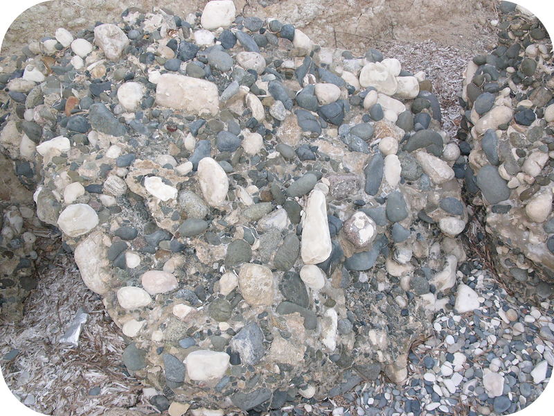 Many tiny rocks stuck together into a big rock