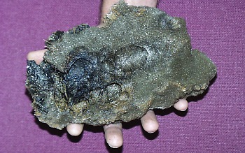 Reticulite is a type of pumice that only forms during eruption of basalt lava by vigorous lava fountains. It consists of fragile volcanic glass that has cooled incompletely around the walls of gas bubbles. The bubbles formed during the
