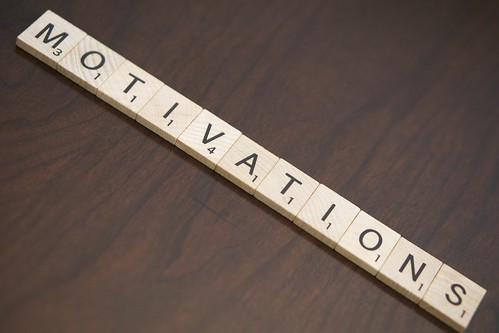 Motivations spelled with Scrabble tiles 