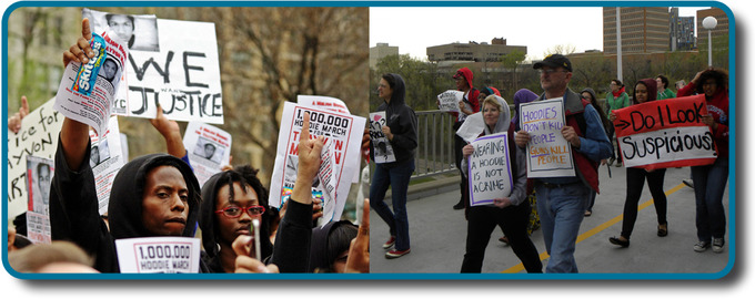 Protesters holding signs, demanding justice for Trayvon Martin.