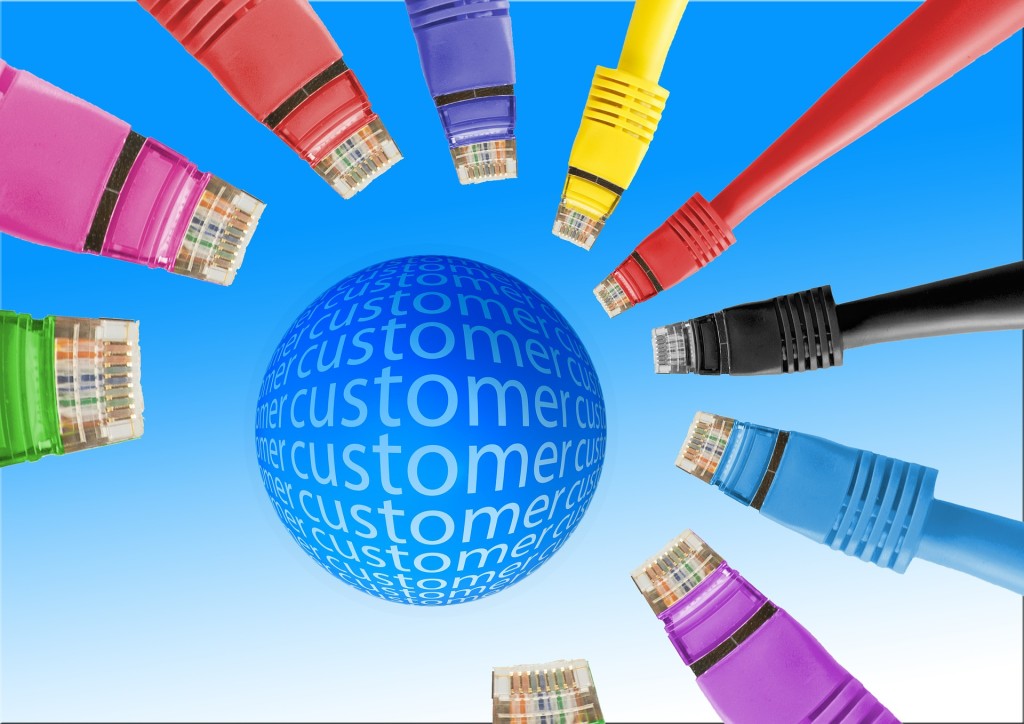 Graphic showing a circle in the center with the word CUSTOMER repeated across it; the circle is surrounding by nine computer cables aimed at it.
