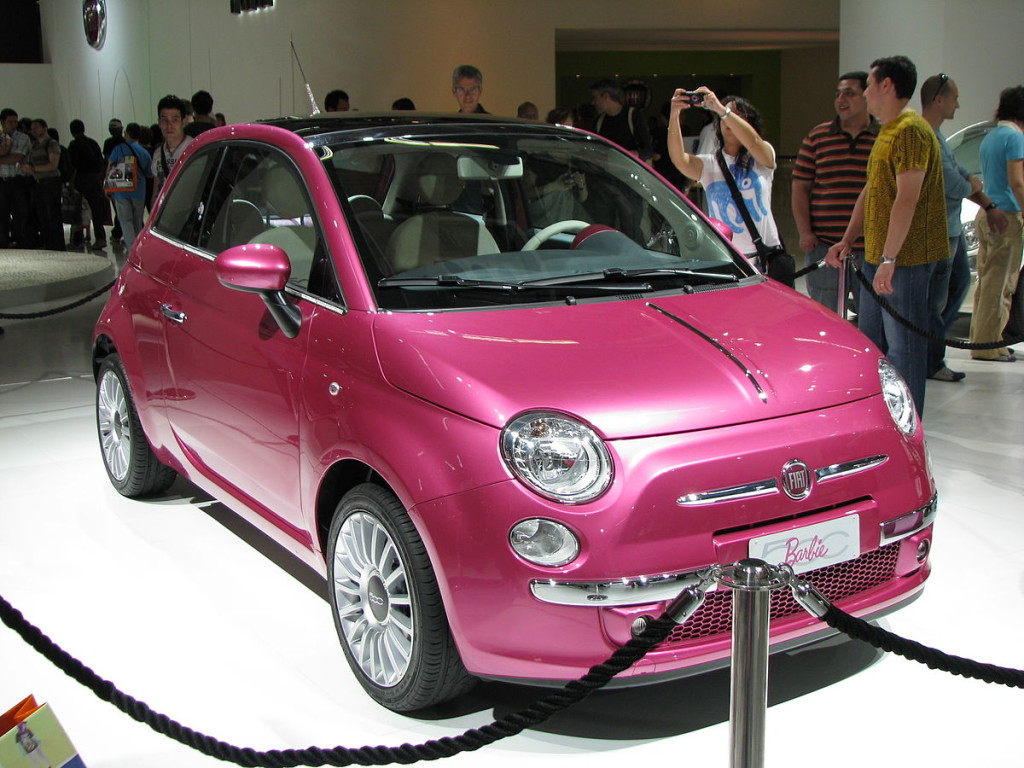 A pink two-door car.