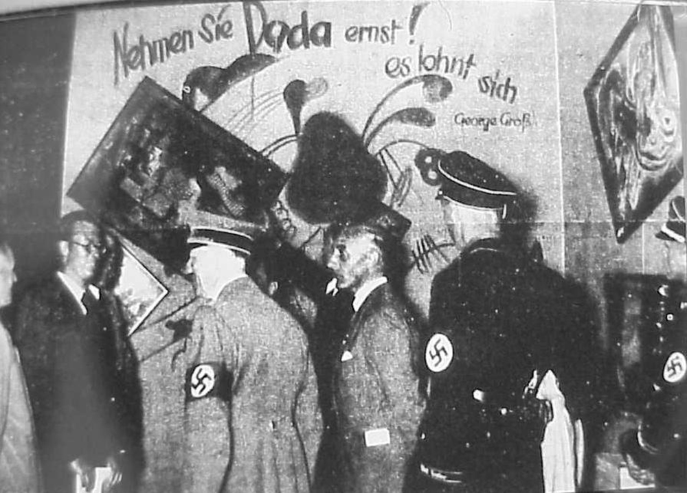 Adolf Hitler and Adolf Ziegler inspect the installation by Willrich and Hansen of the Degenerate Art Show, 1937