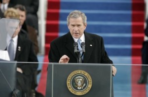 President Bush behind a podium with the US seal