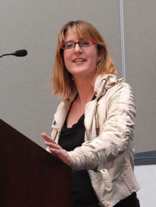 A woman giving a presentation