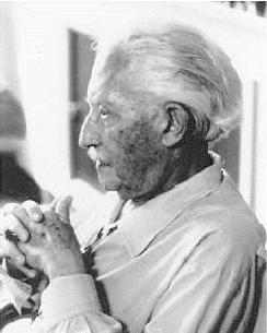 A photograph depicts Erik Erikson in his later years.
