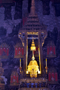 Golden Buddha statue in a Tibetan shrine