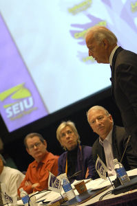 Joe Biden being questioned by a panel of people.