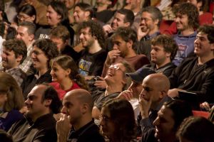 Audience laughing.