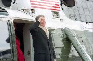 Ronald Reagan saluting by a plane
