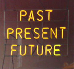 Neon lights that say Past Present Future