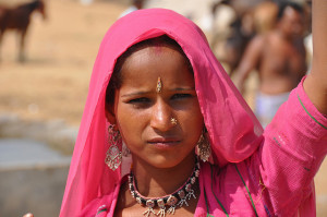 Indian woman in Rajasthani clothing and jewelery.