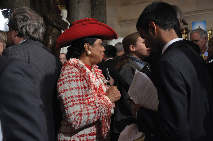 Photo of Congresswoman Frederica Wilson, wearing a red cowboy hat.
