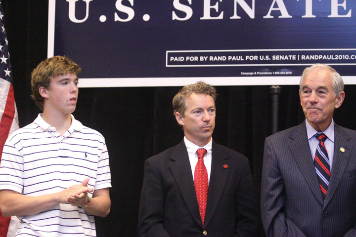 Photo of United States Senate candidate Rand Paul at a rally in Erlanger, Kentucky, along with Texas Congressman Ron Paul and his son, Will Paul.