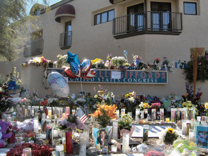 Photo of a makeshift memorial for Gabrielle Giffords outside her office in Arizona 