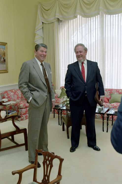 Photo of President Reagan standing beside Robert Bork.