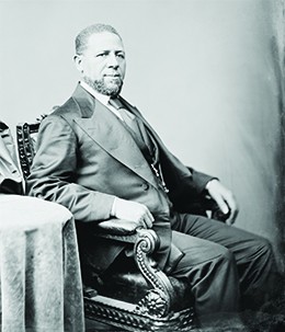 A photograph of Hiram Revels is shown.