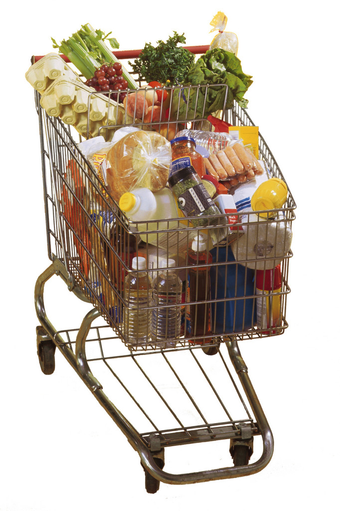 A shopping cart full of groceries.