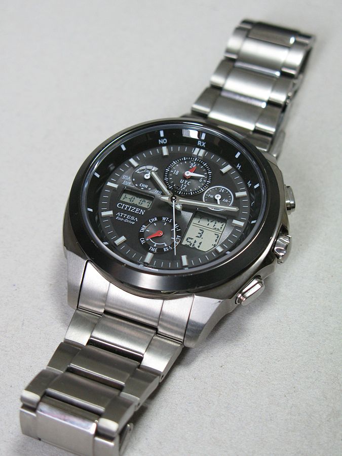 A wristwatch with several smaller measurement tools embedded within the clock.
