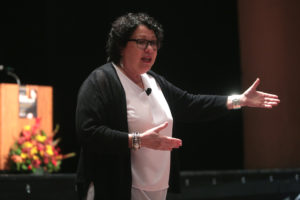 United States Supreme Court Justice Sonia Sotomayor speaking to attendees at the John P. Frank Memorial Lecture at Gammage Auditorium at Arizona State University in Tempe, Arizona while gesturing with her hands.