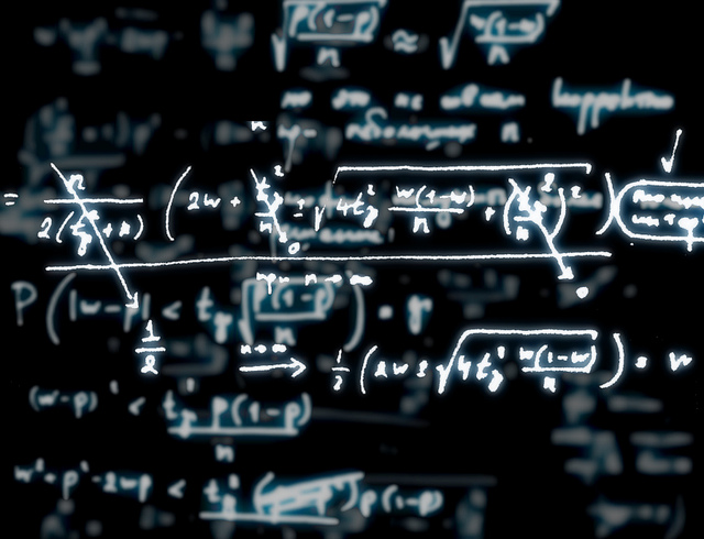 Illustration of layers of mathematical equations written on a chalkboard. The topmost layer is glowing white and only barely legible