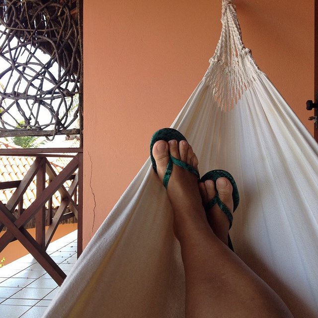 Feet propped up in a hammock