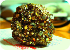 Figure 1. This mineral has shiny, gold, cubic crystals with striations, so it is pyrite.