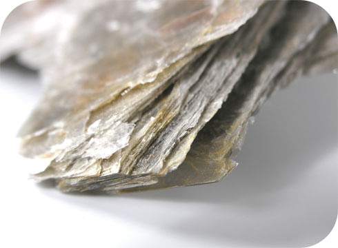 A series of thin, brittle-looking stone sheets