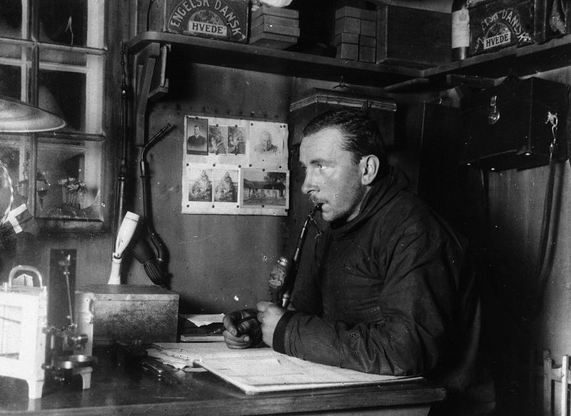 Alfred Wegener smoking at a desk
