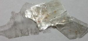 Thin sheets of a translucent, shiny mineral