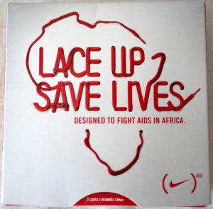 Ad from the Red Campaign, showing Nike's support for fighting AIDS in Africa. The poster reads, 
