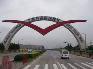 Arch over a highway that reads,