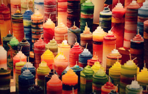 Photo of many multicolored candles.