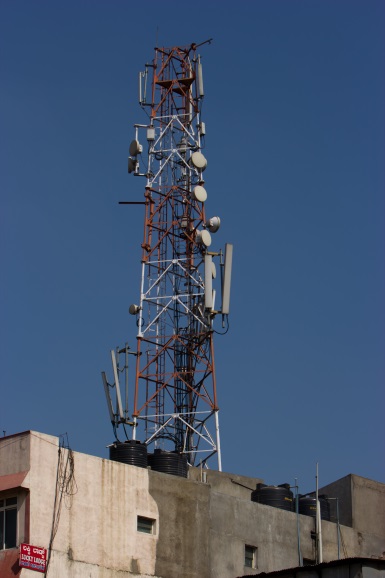 India has the world's second-largest mobile phone user base of 996.66 million users as of September 2015. Shown here is a roof top mobile phone tower in Bangalore 