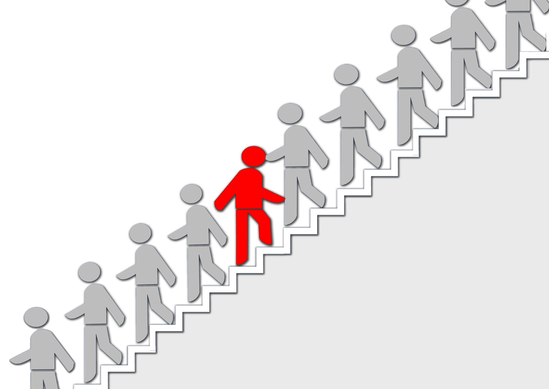 Image of several grey silhouettes walking down a set of stairs. One red individual is walking up the stairs instead.